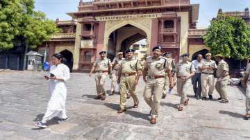Senior police officers inspect an area during curfew in Jodhpur on Wednesday, May 4, 2022. The curfew was imposed after clashes broke out between two communities on May 3.