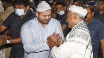 Nitish Kumar with Tejashwi Yadav at an Iftar party in Patna, Friday, April. 15, 2022.