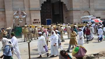 Muslim devotees come out after offering Friday prayers amid security, at Gyanvapi Masjid in Varanasi on Friday. 
 