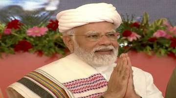 Prime Minister Narendra Modi during a public meeting at Atkot, in Gujarat. 
 