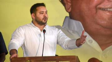 RJD leader Tejashwi Yadav addresses the party workers during Bhamashah Jayanti programme, in Patna, Friday, April 29, 2022.
 