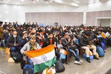 Students, who were about to be rescued, sit with the Indian flag. Read to know how PM Modi-led govt carried out two rescue operations in Yemen and Ukraine.