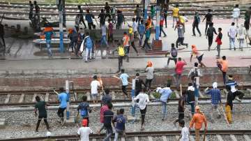 Protester vandalise properties at the Danapur Railway Station in protest against the Agnipath scheme outside Danapur Railway Station, near Patna, Friday, June 17, 2022.