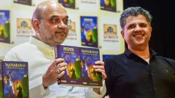 Union Home Minister Amit Shah with with author Omendra Ratnu during the launch of the book Maharaja: Sahastra Varshon Ka Dharmyudh in New Delhi, Friday, June 10, 2022.