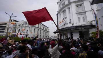 Colombo: Members of Socialist Youth Union shout slogans blocking the entrance to Sri Lankas police headquarters during a protest
 
