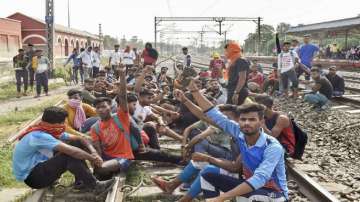 Protestors block railway tracks over protests in connection to Agnipath scheme. 