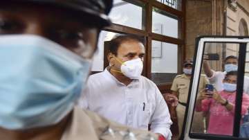  
Former Maharashtra Home Minister Anil Deshmukh walks out after appearing before the Chandiwal Commission regarding accusations in bribe case imposed by former Mumbai police commissioner, in Mumbai. 
 