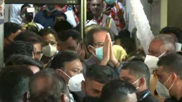  Maharashtra CM Uddhav Thackeray and state minister Aaditya Thackeray leave Shiv Sena Bhawan after the culmination of the party's national executive committee meeting.