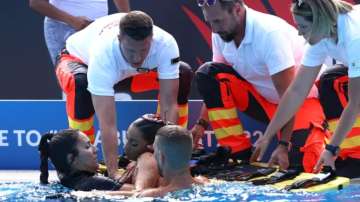  Alvarez wasn't breathing when she was pulled back up by her coach.
