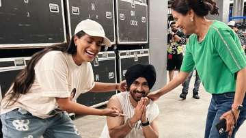 Diljit Dosanjh falls at the feet of YouTuber Lilly Singh's mom at Toronto concert