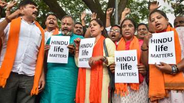 Members of Hindu Janajagruti Samiti shout slogans during a protest over the killing of tailor Kanhaiya Lal in Udaipur, in Bengaluru, Wednesday, June 29, 2022.