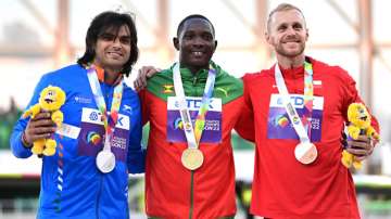 Silver medallist Neeraj Chopra of India poses along with Gold medalist Anderson Peters of Grenada along with Bronze medal winner Jakub Vadlejch of Czech Republic during the medal ceremony of the the Men's Javelin Final at the World Athletics Championships 2022 in Eugene.
