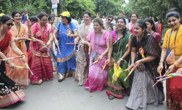 Women playing dandiya during Navratri in Mumbai. 