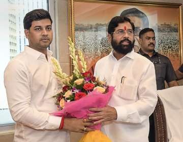 Maharashtra Chief Minister Eknath Shinde with his son and Shiv Sena MP Shrikant Shinde