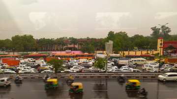 Traffic jam at Dhaula Kuan during monsoon rains, in New Delhi.