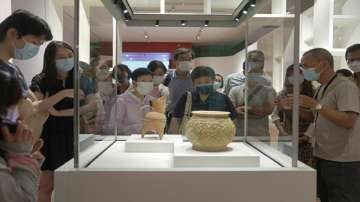 Visitors tour the Hong Kong Palace Museum during the first day open to public in Hong Kong. 