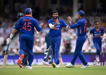 Team India celebrating a wicket off Bumrah's delivery.