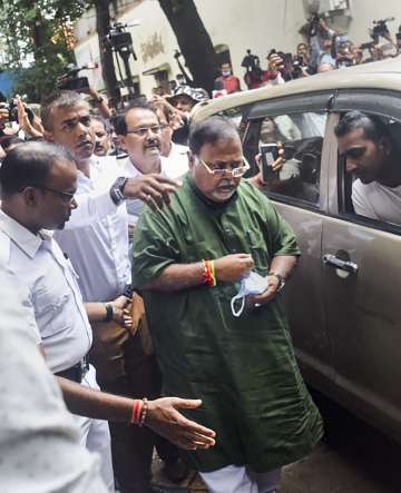 West Bengal Minister Partha Chatterjee being produced at a court after he was arrested by Enforcement Directorate (ED) officials in connection with its investigation into the teacher recruitment scam, in Kolkata, Saturday, July 23, 2022.