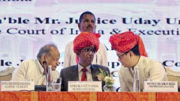 Jaipur: Chief Justice of India NV Ramana, Rajasthan Chief Minister Ashok Gehlot, Union Law & Justice Minister Kiren Rijiju during the 18th All India Legal Services Authorities Meet, organised by National Legal Services Authority (NALSA)