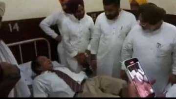 Punjab health minister forces VC to lie down on dirty mattress.