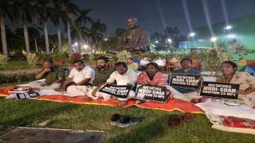 The Rajya Sabha MPs are holding the protest near the Gandhi statue and will stay at the site through night.