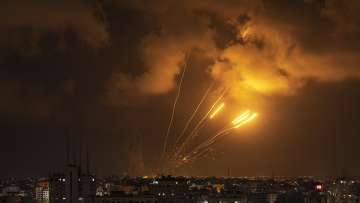 Rockets fired by Palestinian militants toward Israel, in Gaza City. Palestinian officials say at least 15 people have been killed in Gaza, including a senior militant leader and a 5-year-old girl. 