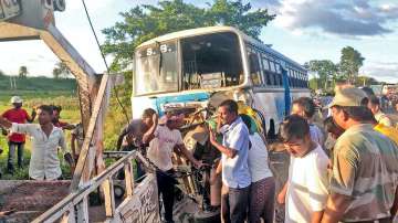 Wreckage of an auto rickshaw being towed away after it collided head-on with a South Bengal State Transport Corporation (SBSTC) bus on National Highway-60, in Birbhum district, Tuesday, Aug. 9, 2022.