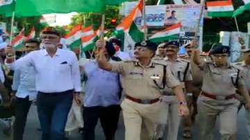 Several people were seen walking with the tricolor on the streets