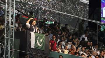 Pakistani opposition leader Imran Khan addresses his party supporters in Lahore