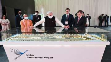 Prime Minister Narendra Modi visits an exhibition on Noida International Airport, in Jewar, Thursday, Nov. 25, 2021. UP Chief Minister Yogi Adityanath is also seen. (File photo, Representational image)