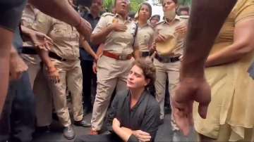Cops later dragged Priyanka Gandhi into a police vehicle and detained her. 