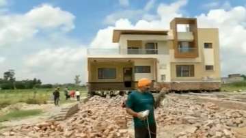 Farmer in Punjab's Sangrur moves house as it comes in way of Delhi-Amritsar-Katra Expressway.