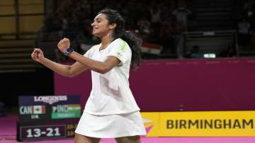 India's Venkata Sindhu Pusarla reacts after winning the Women's singles gold medal badminton match against Canada's Michelle Li at the Commonwealth Games in Birmingham, England, Monday, Aug. 8, 2022.