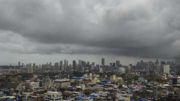 Monsoon clouds gather over the city skyline, in Mumbai, Friday, Aug. 5, 2022.