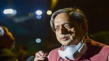 Congress MP Shashi Tharoor interacts with media at Parliament House during ongoing Budget Session 2022, in New Delhi.