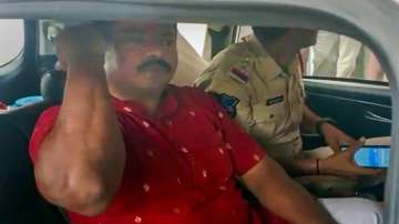 Hyderabad: Telangana BJP MLA T Raja Singh being taken away after he was arrested for allegedly making derogatory remarks against Prophet Muhammad, in Hyderabad.