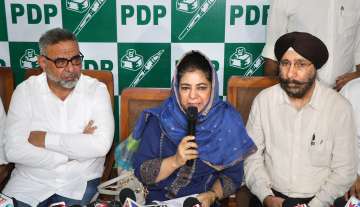 Peoples Democratic Party (PDP) President Mehbooba Mufti addresses a press conference, at the party office in Jammu, Tuesday, Sept. 13, 2022. 