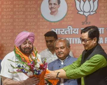 Amarinder Singh joins BJP in the presence of Union Minister Kiren Rijiju. 