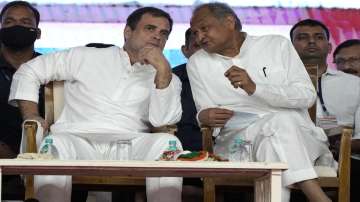 Congress party leader Rahul Gandhi, left, listens to his colleague and Rajasthan state chief minister Ashok Gehlot during their party workers meeting in Ahmedabad earlier in the month. 