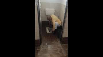 BJP MP Janardan Mishra, BJP MP cleans toilet, Janardan Mishra, Janardan Mishra BJP, Janardan Mishra 