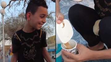 Little boy selling coffee in Iraq