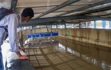 A waterlogged subway at Rajiv Chowk following heavy rains, in Gurugram. 