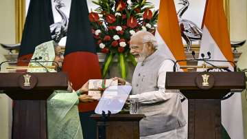 Prime Minister Narendra Modi with his Bangladeshi counterpart Sheikh Hasina during the release of a joint statement after their meeting, at Hyderabad House in New Delhi. 