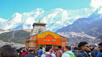 Devotees during the opening of the doors of the Kedarnath Temple, in Rudraprayag district.