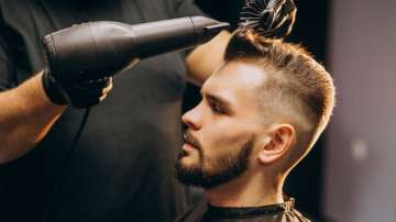 Man getting haircut: image for representation