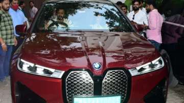 Riteish Deshmukh and Genelia D’Souza in their new BMW car