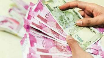 The rupee consolidated in a narrow range and settled 9 paise higher at 81.58 (provisional) against the US dollar on Tuesday as the American currency retreated from its elevated levels.