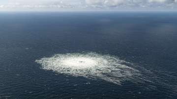 A large disturbance in the sea can be observed off the coast of the Danish island of Bornholm Tuesday, Sept. 27, 2022 following a series of unusual leaks on two natural gas pipelines running from Russia under the Baltic Sea to Germany have triggered concerns about possible sabotage.