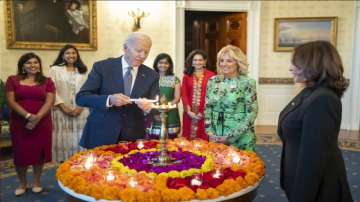 US President Joe Biden lights Diwali lamp at White House