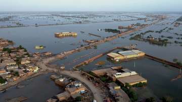 Homes are surrounded by floodwaters in Sohbat Pur city, a district of Pakistan's southwestern Baluchistan province, Aug. 29, 2022. 
